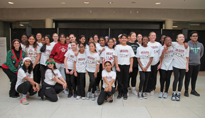 A picture of Miss. Popino’s dance team performing at the Woodbridge Mall (photo from the IMS web page)