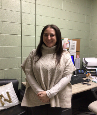 Ms. Rodriguez in her office after the interview.