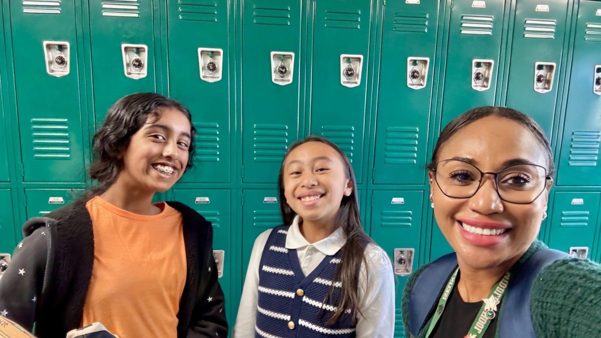 Riya Prabhu (left), Erceline Argonza (middle), and Mrs. Silvestri (right) standing in the 500 wing . (By: Lorna Silvestri)