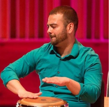 Mr. Vazquez is shown playing the drums. This picture was first published in the Press of Atlantic City.

