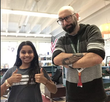 ( Mr. Wasko standing next to  one of her students named Sidhi Patel 