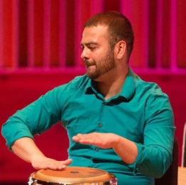 Mr. Vazquez playing The Mini Djembe Drum. (Press of Atlantic City)
