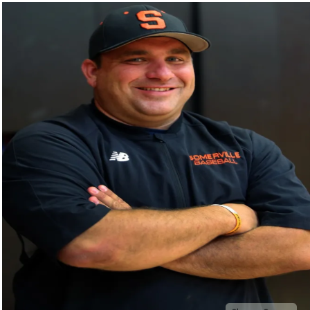 Mr. Banos smiling after becoming Baseball  Coach of the Year
(Photo by MyCentralNewJersey)